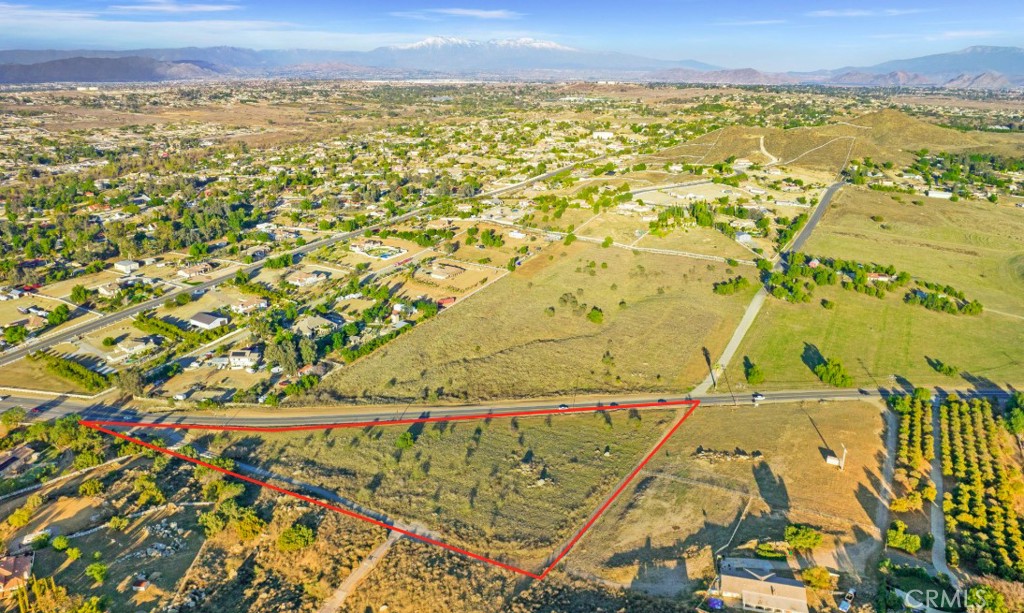 This 4.08-acre lot in Woodcrest presents a rare opportunity for those seeking open land in a desirable location. With flexible zoning options, the property is ideal for a variety of uses—whether you're considering building your dream home, starting a business, establishing a farm, or creating a space for your church.
The expansive lot offers ample room for family gatherings, parked vehicles, and even a workshop, while also providing enough space for horses and other animals. Additionally, utilities are conveniently located very close to the lot, making it easier for you to develop the property according to your needs.
Its central location ensures easy access to major freeways like the 15, 215, 91, and 60, facilitating convenient commuting throughout the Inland Empire.
If you're interested in learning more about this exceptional property, please don't hesitate to reach out. I would be glad to share additional details and answer any questions you might have!
The 9.47 acre lot across Harley John is also available (APN# 285-370-033 / Listing ID# PW25038816).
