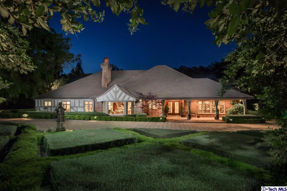 Absolutely exquisite, single story French Country Estate in PRIME La Canada Flintridge neighborhood. This stunning, gated property is situated on 2.18 acres of private park-like grounds with sophisticated gardens, mature trees, lush foliage with an expansive circular paving stone driveway flanked by decomposed granite pathways that evoke a sense of unparalleled tranquility. Beautifully and extensively renovated in 2006-2008 with exceptional quality finishes and craftsmanship throughout. Romantic, European-inspired details with custom high-end amenities are the hallmarks throughout this 6 bedroom 8 bathroom home. The ideal single story floor plan offers warm and welcoming rooms perfect for entertaining yet comfortable living for the most discriminate tastes. This truly elegant property also includes a 693 sq.ft. detached guest/pool house with fireplace, pool, spa, lighted sport court, putting green, built-in barbecue, outdoor fireplace and cozy fire pit. Breathtaking views of the mountains and meticulous grounds can be enjoyed from multiple vantage points of this property. Simply stunning, rare find that is waiting to welcome you home. Award winning La Canada Schools.