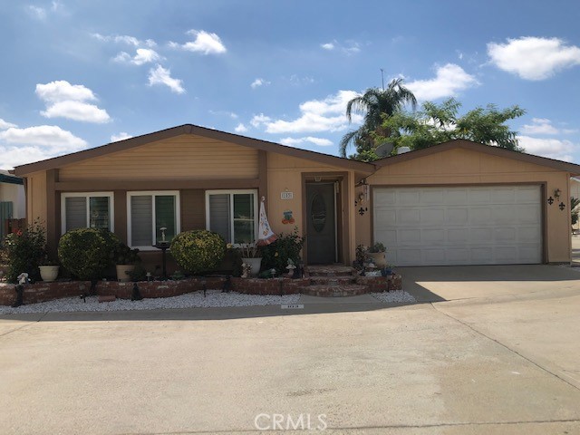 WELCOME TO SUN MEADOWS 55+ COMMUNITY. This is a 2 bedroom, 2 bath home. With granite flooring and plantation shutters throughout most of this home you will be amazed. Enter into a spacious living room that takes you into the open kitchen. The granite countertops, white cabinets, and beautiful mosaic on the walls are sure to wow you. Next to the kitchen is a beautiful dining room with a sliding door out to the patio. A very nice guest room with mirrored closet doors and a tv on the wall that will surely make your guest feel at home. The guest bathroom has a shower/tub and beautiful mosaic on the walls. A large master bedroom with a sliding door leading out to patio as well. The master bath has a garden tub, a separate shower, and beautiful granite countertop as well as beautiful mosaic on the walls. The laundry room with a granite countertop desk area makes a nice work area. This home has ceiling fans throughout, a newer water heater, newer A/C unit, a water softener, and new cabinets. TV's on walls stay, microwave, refrigerator, and patio furniture. This is a MUST SEE home, come soon!