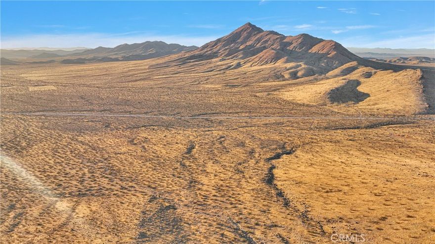 Own 10 acres of beautiful Apple Valley land!  Enjoy the beautiful breath-taking views from your very own land on the hill.  Enjoy being out in the fresh desert air while riding off-roading toys, hiking, or camping out and enjoying the views.  Approximately 10 miles from 15 Frwy.  Use GPS coordinates 34.680258/ -117.095809.  Outlines in photos are approximate- use land surveyor for exact land lines.