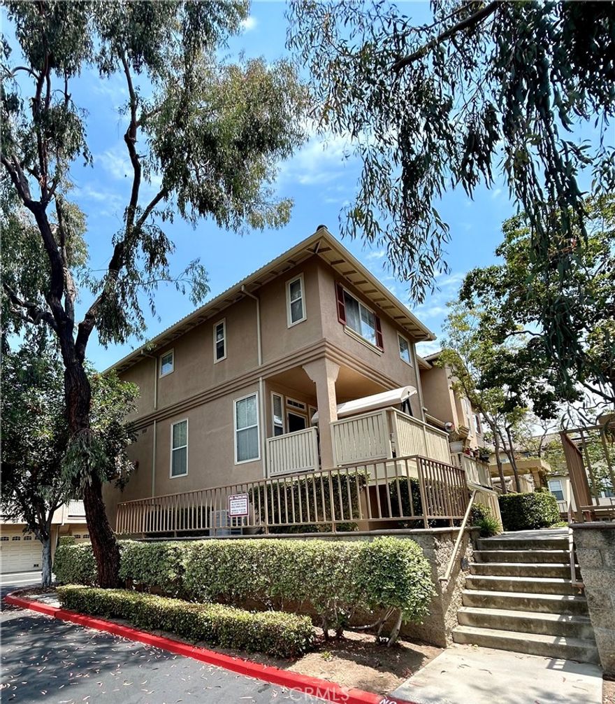 This is a beautiful Tri-Level townhome in city of Anaheim with attached garage and no neighbors above or below you. Securely located in a gated community, end-unit home through the direct-access two car garage, which is equipped with an EV charger. In addition there is a bonus room (can be used as fourth bedroom) adjacent to the garage on the entry level. It offers light, open floor plan, high ceilings, laminate floors, crown moldings, private patio at the front door and a separate balcony near the kitchen, includes all kitchen appliances, washer, dryer, Central AC - Electric- Energy Star. All three bedrooms are located on the third level, including the large primary bedroom with walk-in closet and private bath. Enjoy community pool, spa hot tub.  Conveniently located near Disneyland, Angel Stadium, Great Wolf Water Park and access to freeways 5,55,22. Home will be professionally cleaned and ready for immediate move in. Pets are welcome.