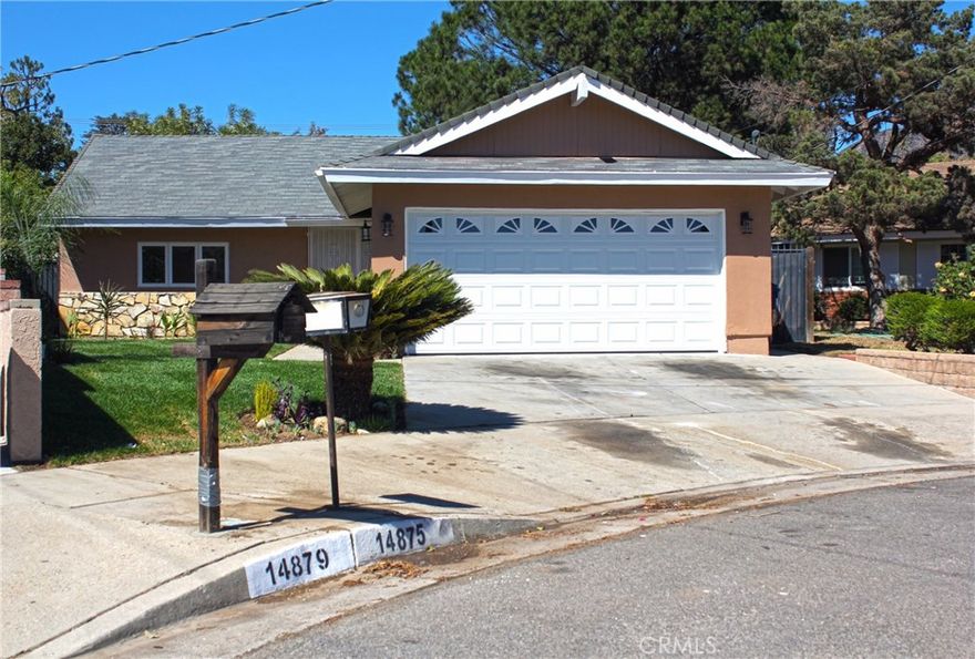 This beautiful home offers a spacious floorpan with 3 bedrooms, 2 bathrooms and almost 1500 square feet of living space. property ready to move in, and open floor plan,and custom kitchen & granite counter-tops, New dual pane windows & new LED lighting. property is very close to all your daily necessities. travertine flooring on kitchen & living room with  brick fireplace, laminate flooring on all bedrooms. new front landscapes. new heater unit & AC unit. you need to stop by and see this lovey single story home.