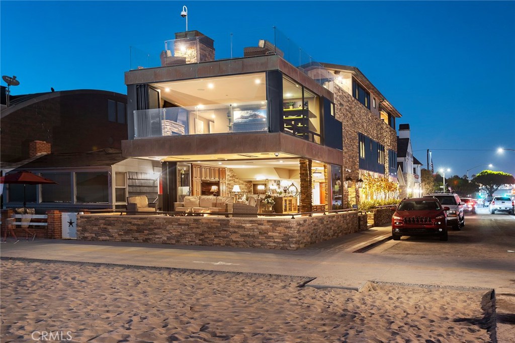 BEAUTIFUL OCEANFRONT HOME DESIGNED BY BRION JEANNETTE & COMPLETED FROM GROUND UP IN 2016. Home is Turn-Key, Fully Furnished & move in ready. Features a Copper Roof, Fire Sprinklers & Elevator. Home is in a prime location on a corner lot facing the boardwalk with a full ocean view of the Coastline, Catalina Island & Mtn. view. 1st level of the house features a Gourmet Kitchen with top of the line appliances including a Wolf 6 Burner Stove/Grill, Copper Hood, built in Steam Oven, Sub Zero Refrigerator & a wall mounted French La Cornue Rotisserie. The living room has accordion glass doors & automatic shades that open to the patio, to become 1 large indoor/outdoor space, with a Fire Pit & white-water views. The Savant Smart Home System can be accessed from Smart Devices & controls audio, video, blinds & lights throughout the home. Tile Floors are heated with individual controls for each room or area including the outside top deck. Upstairs 2nd & 3rd levels have a Master Bedroom, fireplace, ocean views, private office & 3 additional Bedrooms & Bathrooms. A Unique 450 S/F Bonus Room on the 3rd floor is not considered legal S/F but may just be the best space in the house for privacy and entertainment. It has a Copper Ceiling, 70” T.V. plus a separate Ceiling Projector & a large drop down movie screen. The 600 S/F. Roof Top Deck has Spectacular Views. Deck has a built in BBQ, Fireplace, Refrigerator & Stove top. 2 car garage.
More details available. SEE VIRTUAL TOUR & ATTACHMENTS!!