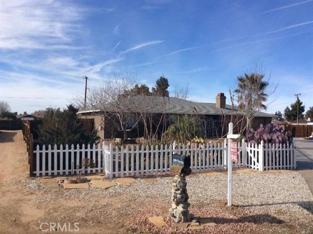 Charming Single Story Home Nestled On An Oversized Lot With Spectacular Views Of The Surrounding Mountains. This Is A Must See Home Boasting A Spacious Family Room W/Wood Floors and Fireplace with custom mantel, Upgraded Kitchen with granite counters and stainless steel apppliances and breakfast nook. Roomy Indoor Laundry Room with 1/2 bathroom, 3 Oversized Bedrooms and 2 Full Baths. On a Large Corner lot with RV access. Front natural landscaping, and Low maintenance back yard. Association Amenities: None # of RV Spaces: 0 Special Features: BN,,PTRY,SH,,GZNONE Lot Location Type: Standard Location Special Features: Garage Door Opener, Underground Util: # of Attached Spaces: 2 # of Detached Spaces: 0