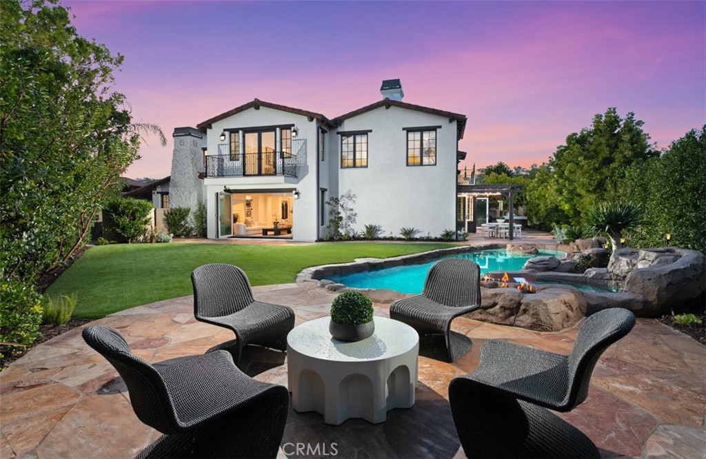 Among the finest homes to be offered in the exclusive guard-gated community of Pacific Ridge, and sited on one of the largest, private lots, 11 Hidden Pass sets the benchmark for California Coastal living at its finest. Expanded & newly renovated from its original condition, the home provides function & style across ~5,245 sqft of newly renovated living space, complemented by 5 en-suite bedrooms & remodeled bathrooms with smart toilets, executive office, and private gym. Upon entry, guests are welcomed by rich hardwood flooring that invites you to experience the rest of the home. The kitchen, highlighted by chef’s grade appliances, soft-close cabinetry, and new stone countertops, lies open to the family room & living area. Three sets of bi-folding doors create seamless transitions between the indoor and outdoor spaces, allowing for large-scale celebrations or intimate gatherings alike all while taking in the natural beauty found throughout the property’s sprawling grounds.
The oversized, resort style backyard is completed with pool & spa with water feature, outdoor BBQ area with new stone countertops, new artificial turf & privacy landscaping, and newly sealed hardscape, comes together to create an oasis-like setting in the privacy of your own home.
The upstairs level features 4 en-suite bedrooms, including a junior-primary suite, and an expanded Primary Suite that is en-par with the largest custom homes in the zip code.
The spa-like primary bathroom boasts new marble slabs, new cabinetry, and large walk in closet with built-ins.
Award-winning schools, world-class shopping, and proximity to parks/hiking trails, complete this irreplaceable dream home.