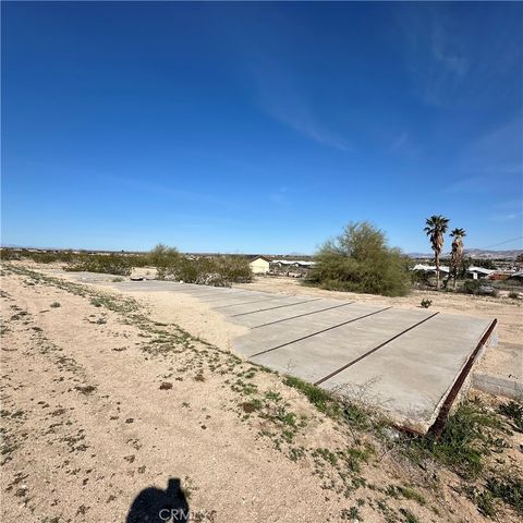 Photo of 6136 Adobe Road, 29 Palms, CA 92277 (MLS # JT24055439)