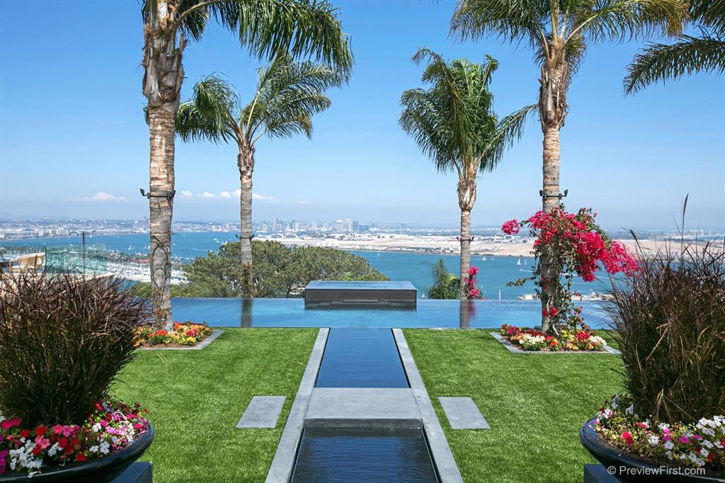 Come let the warm feeling of excitement be yours year round in a once in a lifetime property that can’t be replicated. This outstanding slice of paradise rivals any five star resort experience with its full emphasis on indoor-outdoor living and views that harmonize ocean, bay and an active city skyline that does not exist anywhere else. Situated on a private pinnacle lot this extraordinary property boasts front row seats to see nature’s show take place...see supplement Neighborhoods: La Playa Equipment: Dryer,Fire Sprinklers,Garage Door Opener, Range/Oven, Washer Other Fees: 0 Sewer: Sewer Connected Topography: GSL