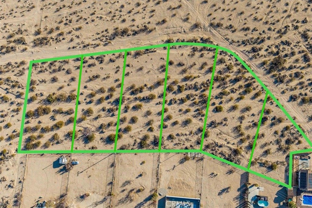 This spacious residential parcel, just under 3 acres, offers a prime development opportunity in the growing city of Twentynine Palms. With flat, buildable terrain and ample space, the property is well-suited for investors, developers, or anyone looking to build in a high-demand desert market.
Based on recent discussions with the City of Twentynine Palms, this parcel was originally configured as 6 separate lots. There may be potential to reestablish that original configuration, providing flexibility for a small residential subdivision or multiple custom home sites. Buyers are advised to verify all subdivision and zoning possibilities with the city.
Zoned for residential use and located near existing utilities (buyer to confirm), the property is ideally situated just minutes from local schools, shops, Joshua Tree National Park, and the Marine Corps Air Ground Combat Center—bringing strong long-term value and demand for housing in the area.
Whether you're looking to develop now or invest in land with future upside, this parcel is a standout opportunity in one of Southern California’s fastest-growing desert communities.