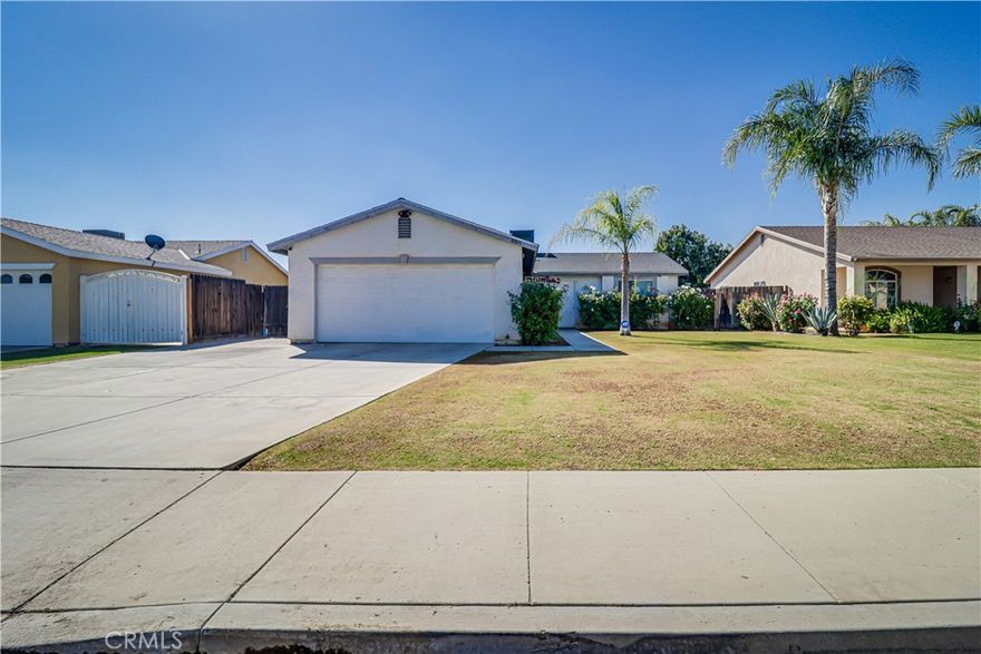 Cute and cozy 3 bedroom, 2 bath home located in Northeast Bakersfield. The spacious kitchen has tile countertops and lots of storage. Out back you'll find a large yard with a covered patio and plenty of room for the kids to roam and play. Excellent opportunity for a first time homebuyer or investor. Located in close proximity to schools and shopping.