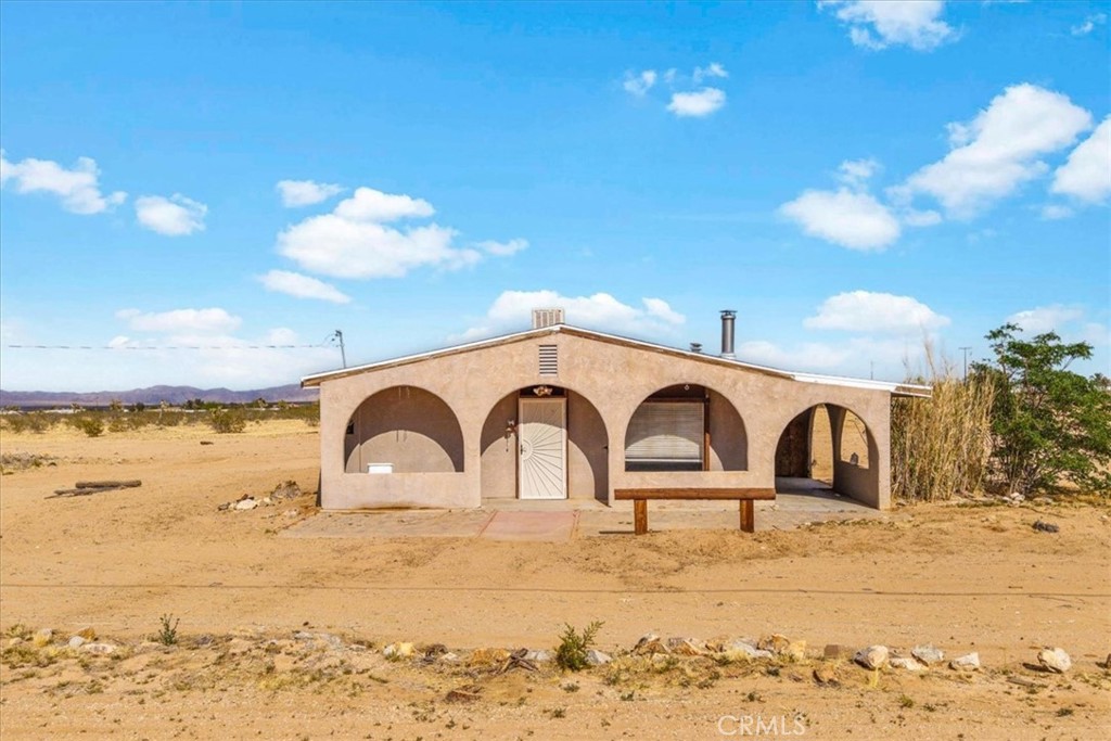 Desert Dream Fixer on Five Acres – Stargazer’s Paradise in Landers, CA
Nestled on five picturesque acres in the heart of Landers, this 2 bed, 1 bath fixer-upper offers an extraordinary opportunity to create your desert retreat or investment gem. Surrounded by breathtaking desert flora, serenity, and jaw-dropping views, this property is perfect for those seeking peace, privacy, and the magic of the Mojave.
Just a short distance from Giant Rock—the world’s largest free-standing boulder and a historic UFO landing strip—and minutes from Goat Mountain, this location is steeped in mystique and natural beauty. Only blocks away from GMARS (Goat Mountain Astronomical Research Station), you’ll be living in a designated dark sky zone, making this one of the best stargazing spots in Southern California. Milky Way views? Absolutely.
Enjoy starry, starry nights, brilliant sunrises and sunsets, and total freedom from light pollution. It’s the ultimate haven for investors, nature lovers, artists, and music lovers alike.
Only:
25 minutes to Pappy & Harriet’s
45 minutes to Palm Springs
A quick drive to Joshua Tree Village for restaurants and culture
This is raw desert magic with room to dream, create, and build. Whether you restore the home or start fresh, the land alone is a rare find in such a peaceful and awe-inspiring location.
Please include a recent pre-approval letter and proof of funds with your offer.
Buyer to verify all MLS information, including but not limited to: permits and uses, bed/bath counts, square footage, school information and enrollment availability. Buyer is advised to independently investigate all aspects of the property, and to verify the accuracy of all information provided through personal inspections and with appropriate professionals to the buyer’s satisfaction.
Buyer is solely responsible for verifying water, power, zoning, and county building requirements.
Buyers are responsible for confirming the accuracy of all information and are encouraged to conduct their own due diligence or retain qualified professionals.