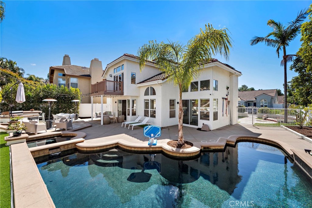 Nestled in a desirable cul-de-sac, this stunning, 4-bedroom, 2.5 bathroom home offers the perfect blend of luxury, comfort, and functionality. Available either FULLY FURNISHED or UNFURNISHED, the beautiful home is located in a sought-after family-friendly neighborhood within walking distance to award-winning schools, this home checks all the boxes—and more.
As you enter through the gated front courtyard, you'll be greeted by beautifully designed low-maintenance landscaping, enhancing the home’s fantastic curb appeal. Step inside to soaring vaulted ceilings, an inviting living room, and a private dining area perfect for entertaining. The updated kitchen boasts granite countertops, stainless steel appliances, and ample storage, seamlessly connecting to a cozy breakfast nook and a spacious family room.
The main level features brand-new vinyl flooring (Bel Air "Rocky Mountain"), creating a seamless flow throughout. Upstairs, all bedrooms are generously sized, and each bathroom has been thoughtfully and timelessly updated—including three fully renovated bathrooms, complete with modern finishes, bidets, and cutting-edge technology. The primary suite is a true retreat, featuring a spa-like en-suite with a soaking tub, walk-in shower, his-and-hers closets, and access to a private deck overlooking the backyard.
This home is packed with premium amenities, including:
• A sparkling pool and hot tub
• Finished closets throughout
• A brand-new washer and dryer
• A fully finished garage
• Two new TVs with Sonos sound system inside and out
• Philips Hue color-controllable lighting inside and outside
• Two outdoor grills and two outdoor heater lamps for year-round enjoyment
• A Murphy bed/desk combo in bedroom 4, plus an optional crib
• Lush turf for low-maintenance outdoor space
• Comprehensive security system with 8-9 exterior cameras and a video doorbell
• An incredible backyard with 60-70 varieties of fruit trees, offering a private oasis
With a new roof, fully paid for solar system minimizing electrical costs, newer AC and furnace, and a soft water system, this home is truly turn-key. Located in the highly desirable Forster Ranch community, residents enjoy access to scenic hiking trails, greenbelts, and parks.
Come see this exceptional home in person—you won’t be disappointed!
