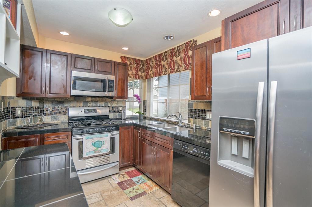 Welcome home to your Calavera Hills retreat with 2 master suites! With charm straight out of a storybook, this beautiful home has it all! This remodeled end unit home has a fully fenced backyard & covered patio, offering the privacy you have always wanted. This home features many upgrades including newer kitchen cabinets, granite countertops, stainless steel appliances, travertine floors & fireplace, walk-in closet, designer tiles in kitchen & bathrooms, & a 2 car attached garage. Your dream awaits! Neighborhoods: Calavera Hills Equipment: Range/Oven Other Fees: 0 Sewer: Sewer Connected Topography: LL