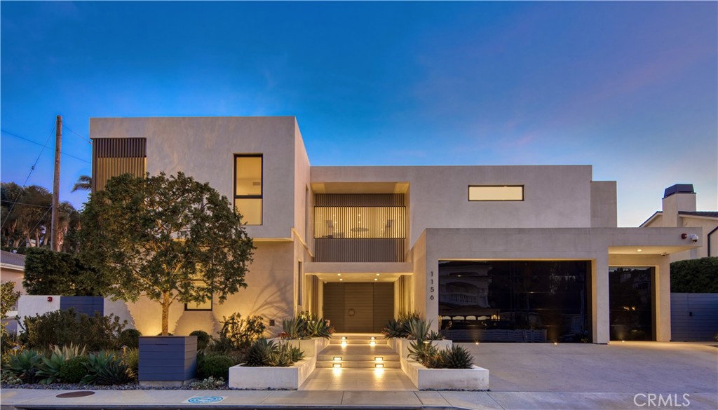 This architectural masterpiece designed by Laney LA and built by RJ Smith Construction sits on a rare oversized 15,000 sq. ft. lot and is arguably one of the finest homes in all of Manhattan Beach. Featuring 8 bedrooms, 8 1/2 bathrooms and over 8,100 sq ft of luxurious living space, you’ll never want to leave.… Upon entering, you are immediately greeted by the home’s splendor and incredible indoor-outdoor flow. The entire south wall of the home has OTIIMA glass pocket sliders overlooking a dream backyard with a sparkling aquamarine pool, water feature, jacuzzi, sports court and an enormous turf lawn. The outdoor kitchen and lounge area have a BBQ, EVO flat grill, large screen TV, firepit and built-in heaters making it an entertainer's dream. Rounding out the backyard’s amenities is a detached guest house with full bath, mini fridge and stacking sliding glass doors. The interior of the home is just as spectacular as the exterior. The chef’s kitchen has a huge center island with seating for 4, Wolf appliances, Twin 36" Thermador Fridge/Freezers, Scottsman Nugget ice-machine, LED lit cabinetry and a large butler’s pantry with an Elkay filtered water dispenser. A large bar area rivals any L.A. hotspot with a mirror as a backdrop that transforms into a TV with the touch of a button. The oversized media room with full bar and fridge serves as an incredible flex space for watching movies, playing games or having late night music jam sessions. The primary suite has an incredible walk-in closet with LED lit custom built-ins and an industrial safe. OTIIMA glass stacking sliders lead to a deck with a fire feature and an outdoor infared sauna. The serene primary bathroom has floor to ceiling marble slabs, dual TOTO toilets, Mr. Steam shower and heated radiant flooring. All other bedrooms are junior suites, with large walk-in closets, electric blackout shades & custom built-ins. One of the bedrooms is currently used a home gym with a “smart workout mirror” providing workouts on demand and a built-in filtered water dispenser. The entire home is powered with 52 solar panels of 320 watts each plus 2 LG battery packs. Other amenities include a FIVE-zone A/C system. hidden subterranean pool equipment, full home automation through a Control-Four system, indoor/outdoor surround sound, 240v car charger and a Flo smart water shutoff system by Moen. A dream home that will make you feel like you are on vacation every day!