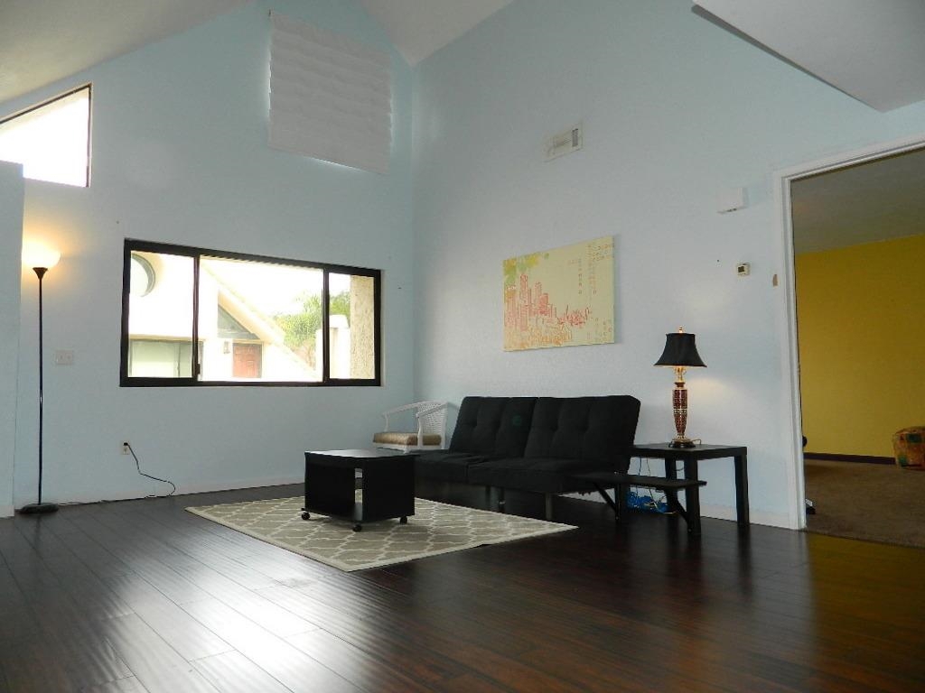 Soaring ceilings and lots of windows make this home light and bright. Cozy fireplace in the living room/dining room. Upgraded distressed espresso flooring. Large balcony off the dining room looks out over the nicely maintained grounds. Breakfast bar in the kitchen. Dual pane windows keep things quiet. Laundry in unit. Complex has 2 pools, clubhouse and tennis court. Close to the 78 frwy, shopping, schools and entertainment. This is a great unit for a starter home or investment opportunity. Neighborhoods: Vista Complex Features: ,, Equipment: Garage Door Opener, Range/Oven Other Fees: 0 Sewer: Sewer Connected Topography: SSLP