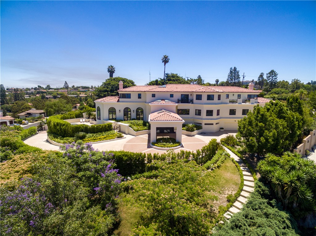 Huge reduction, priced to sell! Majestically situated atop of Palos Verdes Estates highest points, this extraordinary private gated estate overlooks a breathtaking panoramic ocean, city and Queen’s Necklace view. Built on approx 1.45 acres and renovated in 2015, this home is perfect for living & entertaining, encompassing 18,277 sq. ft. of luxurious living space. Drive through the gate and up the long driveway to the grand motor court with ample guest parking. Step inside and feel the open, spacious floor plan with the beautiful marble entry, high ceilings & abundance of natural light. This amazing home boasts 7 bedrooms, 11 baths, and has been beautifully updated with elegant oak wood floors, carpet, trim and greenery. Entertain your friends and guests with your private two lane bowling alley, or a night at the movies with the fully equipped home theater. French doors throughout open to multiple patios & balconies with beautiful sconce lighting, creating an easy indoor/outdoor lifestyle. Enjoy the newly redone regulation sized Tennis Court with viewing pavilion, large pool & spa, and beautiful new landscaping, complete with custom planters. Other grand features include a gym, office, maid’s quarters & laundry facility, dumbwaiter, sauna, 5-car garage. Welcome home. Available for lease as well.