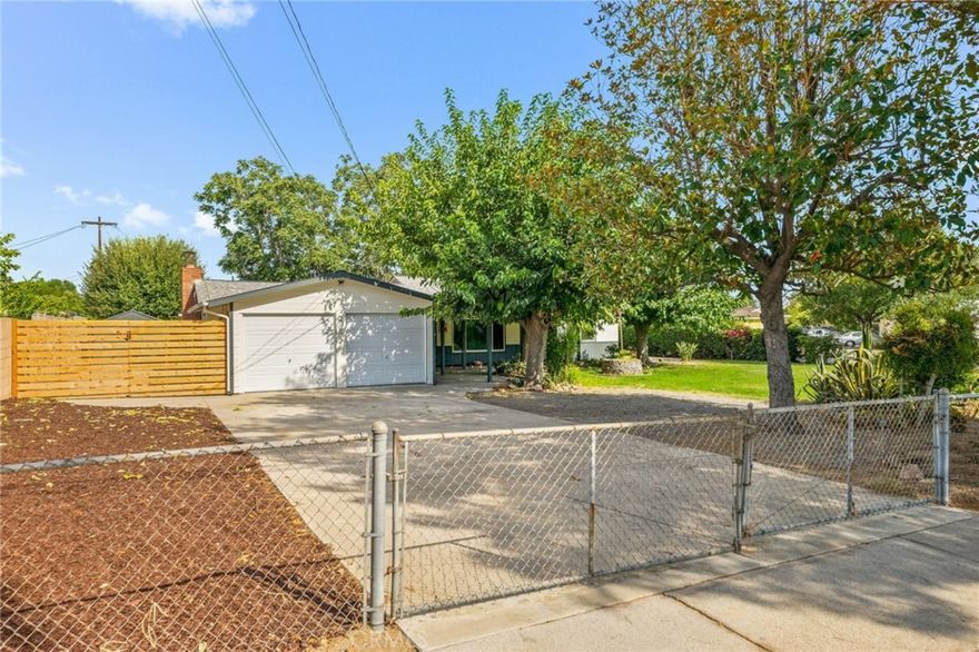 One of the LOWEST PRICED 5 Bedrooms In Rialto! ESCAPE into this Completely Remodeled Turn Key Home with plenty of SPACE & PRIVACY! Step into this open concept Kitchen/Living area that will easily accommodate the whole family! This home features 5 Generous sized bedrooms, 2 bathrooms, with NEW luxury vinyl throughout, NEW quartz countertops, NEW paint, Dual Paned Windows, NEW bathrooms, NEW kitchen, Central Heating & Air, NEW Fixtures, and NEW Garage Doors! Did I mention it has PAID OFF SOLAR! Start Saving Money every single month! The Master Retreat comes with a one of a kind Custom Fireplace and Plenty of Space for Rest and Rejuvenation. This home also features a HUGE Backyard (15,000+ SQFT) with Tons of Trees, Bushes, and Greenery that will make you feel like your own private Oasis. HURRY, THIS ONE WILL GO FAST!!