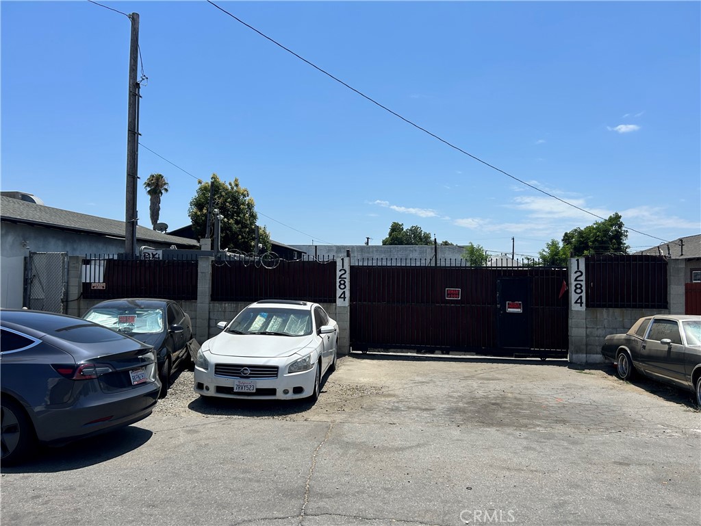Vacant lot, used for storage, business or latest tenant was a tow company.