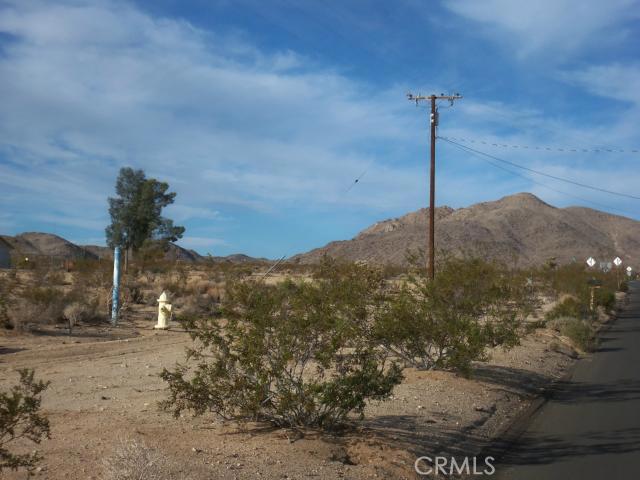 Here is your chance to pick up a nice 1.25 acre lot with a paid water meter. Paved road, Utilities are there. Views in every direction. Quiet neighborhood. Come take a look. Nice price reduction, won't last.