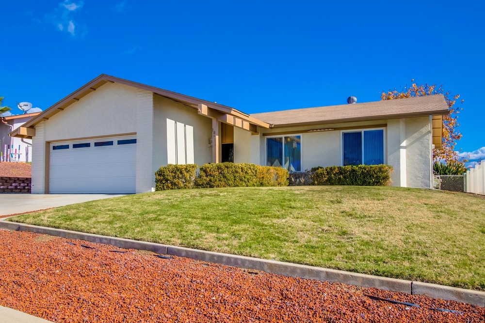 The one you’ve been waiting for! Lovingly maintained home by original owners on a private cul-de-sac in a nice neighborhood. Vaulted wood beam ceilings, brick fireplace in living room, dual-pane windows, large bonus room w/tons of storage currently being used as a formal dining room/office. Large kitchen with breakfast nook and slider to side yard patio area. Spacious back-yard with lush lawns, covered patio, and spectacular mountain views. A must see property. Hurry, this one won't last. Neighborhoods: Santee Other Fees: 0 Sewer: Sewer Connected Topography: LL