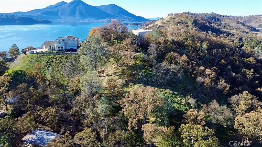 THREE PARCELS SOLD TOGETHER ALL ZONED R1 - Are you ready to build your dream home on this beautiful, lake view, hillside? Three parcels allow for extra elbow room for your dream home, or possibility of multiple homes! Private, and secluded, hilltop location. With limited neighbors. Overlooking the city of Clearlake and Clear Lake itself. OWNER FINANCING AVAILABLE. Additional parcel numbers include 037294010000, 037294020000, 037294030000. Check with the city of Clearlake for building codes and restrictions.
