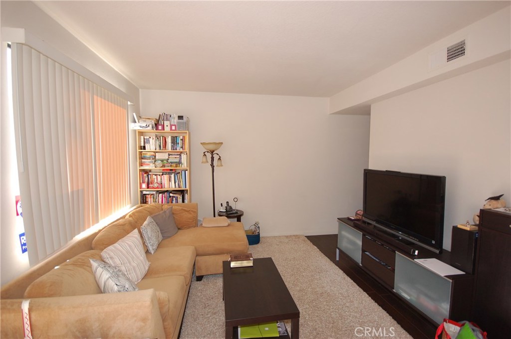 Totally remodeled two story townhome with no one above or below. Spacious patio.Formal living and dining room with open kitchen with brand new appliances and granite counters. Brand new laminate flooring on the main floor and brand newer carpet in both bedrooms. Brand new tub shower and vanities. Two master bedrooms on the second floor, one has a large walk in closet. Home has one garage and one carport. Walking distance to shopping and restaurants. Washer/Dryer included. One car garage and one carport. Association offers two great pool and spa.