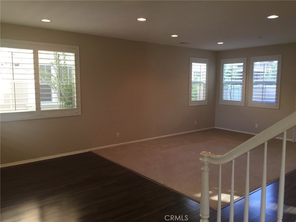 Beautiful Townhome in Irvine Unified School District! This beautiful home is located in the Charming and convenient Columbus Grove Community in Tustin close to the District and all that it has to offer! Upgraded Kitchen with Granite & Recessed Lighting! Plantation Shutters! Wood-lam flooring! Ultra-Convenient Upstairs Laundry! Master Suite w/ En Suite Master Bath and Walk-in Closet! You will Love the Master Bath w/ His/Hers sinks, and a separate shower from the Roman Tub! Enjoy entertaining outside in your private patio backyard. Refrigerator, Washer, Dryer all included! If you are not familiar with Columbus Grove, the community offers a large clubhouse, resort-style pools with separate spas and kiddie pools, parks and playgrounds, basketball courts, and more! Great Proximity to Jamboree, 405, 55, 5 Freeways, John Wayne Airport, UCI, and the entire Central OC economic base! You will Love Living Here!