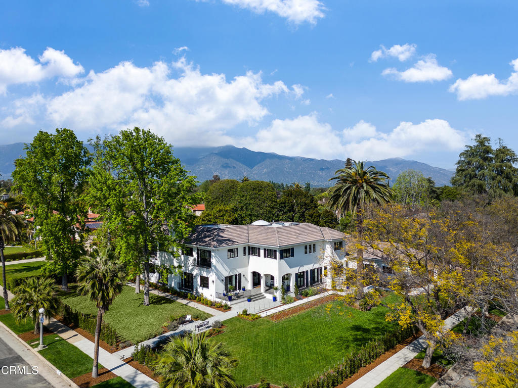 Luxury, elegance & quality craftsmanship blend seamlessly in this rare, new estate in the most prestigious Oak Knoll neighborhood, just a block from the historic Langham Huntington Hotel. Custom-designed & meticulously appointed with no expense spared, this exquisite residence sits prominently on a prime, quiet corner & features every conceivable amenity. The exceptional floorplan showcases grand rooms with tall ceilings, hardwood floors, Ralph Lauren & Waterworks fixtures, Marvin windows & doors, and a private elevator serving all floors This impressive South-facing home welcomes guests into a dramatic foyer with two-story ceiling & a picturesque circular staircase. A spectacular LR with Batchelder-tiled fireplace, a handsome library & a large formal DR, are delightful spaces to entertain in. The gourmet kitchen boasts a marble island, stainless steel appliances, butler's pantry, breakfast area & opens to a fabulous FR. Completing the main level is a guest BR suite, designer BAs, an activity room, a catering kitchen, laundry room & a mud room. Gracing the sunny upper level are five sumptuous ensuite BRs, including a gorgeous primary BR suite with a dazzling spa-like marble BA. The lower entertainment level houses a theater, gym, wine cellar, lounge & a BR suite. Luxuriate indoors in this incredible home! Or step outside & enjoy the appealing pool & spa, alfresco dining from the Lynx grill, relaxing on the terrace & playing in the yard. This quintessential estate has it all!