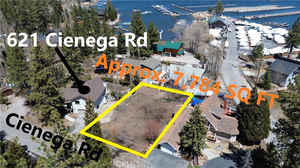 Fantastic large flat lot with lakeviews and prime location just around the corner from the marina & access to Big Bear Lake! Recently surveyed with all survey markers visible. Approximately 7,784 SQ FT of land with all utilities (water,sewer,gas,electric,phone,internet,cable) at or near the street. Lot is mostly cleared, ready for your new home to be designed and built. Million dollar homes throughout the neighborhood. A well built home should have some lakeviews from the main level plus even more lakeviews from a 2nd story. This is a rare opportunity to own a prime lot with an amazing location...make your offer today!