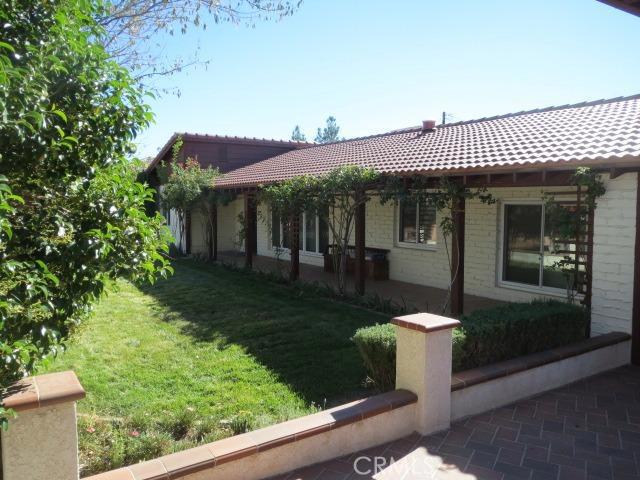 Historic Apple Valley four bedroom, three bath home just east of the Apple Valley Inn complex. Fourth bedroom is currently used as an office. Brand new tile roof, triple pane windows, energy efficient Master Cool system. Full acre lot, generous set back with privacy wall and circle drive. Huge detached shop. Association Amenities: None # of RV Spaces: 0 Special Features: BC,WK,OBNONE Lot Location Type: Standard Location # of Attached Spaces: 0 # of Detached Spaces: 0