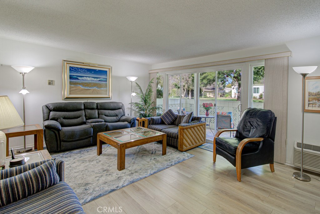 This home is located in Laguna Woods Village a SENIOR Community and is FULLY FURNISHED with everything that you need! This clean and comfortable 2 bedroom/2 bath lower unit has NO STAIRS, is close to the carport for your convenience and is nicely furnished. Laguna Woods Village offers 2 golf courses, gyms, pools, spa, pickle ball, walking trails and so much more. Plus it is located close to Laguna Beach and surrounding Orange County areas! And if you just feel like relaxing at home it has a wonderful tiled patio to enjoy the view of the greenbelt and California's outdoor living.
It's available NOW THROUGH THE END OF DECEMBER 2023. NO pets please!