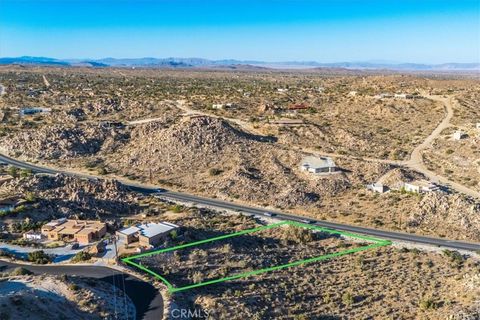 Photo of 596 Buena Suerte Road, Yucca Valley, CA 92284 (MLS # JT24179598) Photo of 596 Buena Suerte Road, Yucca Valley, CA 92284 (MLS # JT24179598)