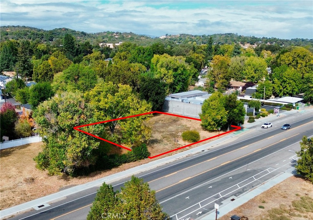 7100 Morro Road has frontage on Highway 41 and brand new frontage improvements installed by CalTrans. The property is located .5 miles from Highway 101 and the flourishing Downtown Atascadero. Paso Robles and San Luis Obispo are both within a 20 minute drive of this location and Atascadero is located between the Bay Area and the LA Area about 3.5-4 hours from each by car. 3 companies have received offshore wind energy leases totaling $425 million dollars to create wind farms, ancillary facilities, and jobs to support their operations in Morro Bay which is a 20 min drive from this property.
The lot is currently zoned Commercial Professional(CP) but, per the City of Atascadero, they plan to change the zoning to Mixed Use(MU) which should allow for more flexibility in what can be built. The exact details of that zoning are yet to be finalized but any Buyer should speak directly with the City of Atascadero to hear about the improved zoning changes that should be finalized in early 2025. With neighboring properties for sale as well, this is a prime development opportunity that could include office, retail, commercial, and residential uses under current zoning and future zoning. Traffic counts nearby at Highway 101 and Morro Road are 61,000 AADT. Recent developments within a half mile include Chipotle, Jamba Juice/ATT, 59 residential unit and 3 commercial office unit mixed-use project, and an office complex.