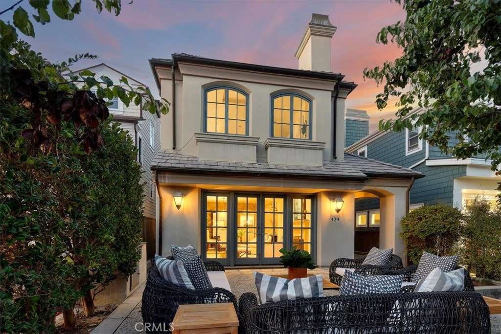 429 5th Street in Manhattan Beach's Sand Section offers luxurious walk-street living with timeless design inspired by French countryside estates. Custom-built by the original owners, this home stands apart with thoughtful details and space planning throughout.
A charming Dutch door opens to a formal entry with a winding staircase and two-story ceilings. The dining area flows into a living room featuring a wood-burning fireplace, library shelving, and French doors leading to a sunny, south-facing front patio. Overlooking the walk-street, the patio enjoys shade from mature trees.
Natural light fills the casual living spaces, accentuated by another wood-burning fireplace with a stone surround and a built-in media center. The home is designed for an active lifestyle, with a hidden beach cubby for storage and a highly functional kitchen with custom built-ins, granite countertops, and a large pantry. Even the cabinetry includes pocket wine storage.
All bedrooms are on the upper floors. The second-floor master suite overlooks the walk-street and includes a dressing room with built-in storage and a master bath featuring a large walk-in shower with dual showerheads. Three additional bedrooms, a full bath with dual sinks, and a cozy library are on the same floor.
A third-floor guest suite offers a living room, full bathroom, bedroom, and a private deck, perfect for multi-generational living.
Located on a quieter section of 5th Street, the home combines walk-street charm with less traffic. With a WalkScore of 86, it’s close to Robinson Elementary and just a short walk or bike ride to downtown Manhattan Beach’s shops, dining, and community activities.