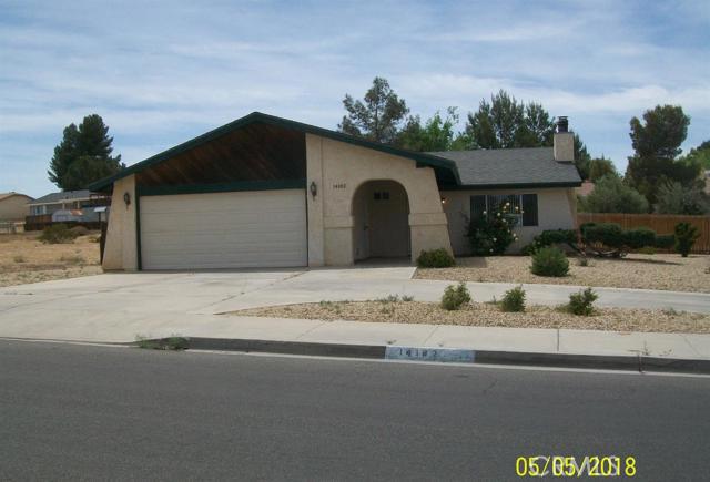Located in the popular Green Tree Estates off Hesperia Rd, this cozy 3 bd/2 ba home has NO Solar Lease! It does include ceiling fans, new interior paint, tile flooring throughout, fireplace in the living room, window coverings, pantry, breakfast nook, linen closet, large pet friendly fully fenced back yard with RV access, low maintenance desert landscaping in the front yard, seasoned trees in back yard. Close to shopping and freeway access for fast commute. Available for showing after 5/7/18 or when painting crew is done. Plenty of room for toys, hobbies, pets, fun. House keeping will be done at the end of the week. A must see at a price you can afford. Association Amenities: None # of RV Spaces: 0 Special Features: BN,,PTRYNONE Lot Location Type: Standard Location Landscaping: Drip Special Features: Garage Door Opener # of Attached Spaces: 2 # of Detached Spaces: 0