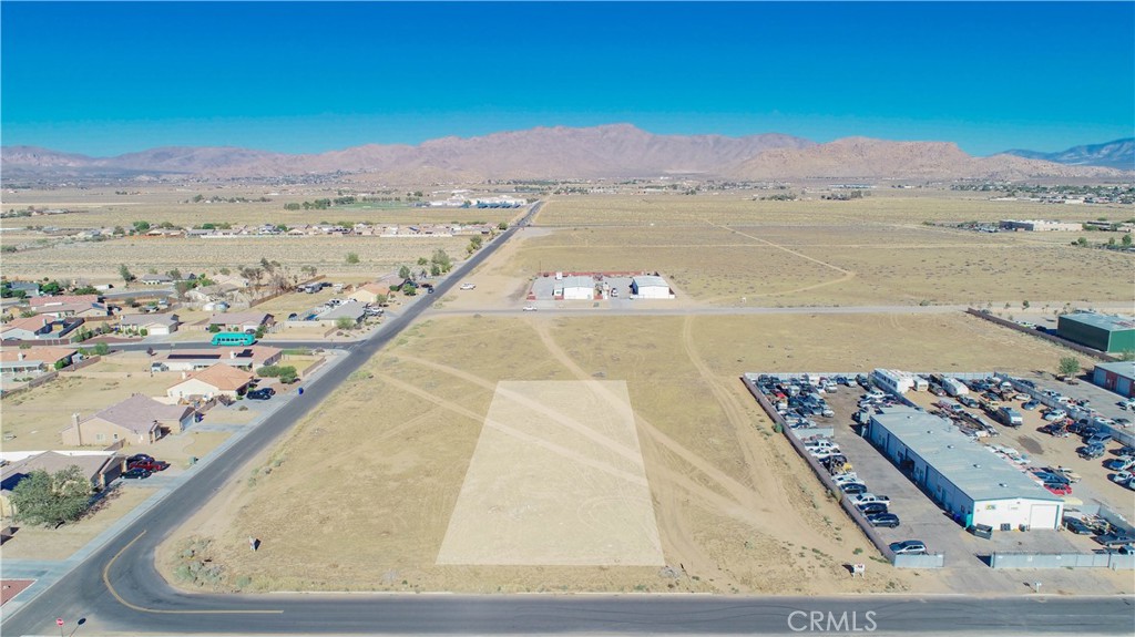 FLAT COMMERCIAL LAND located in Specific Plan zone. Established commercial zone.