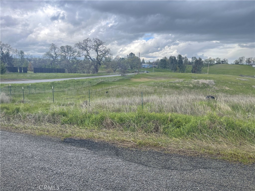 Corner lot not too far from main entrance to Rancho Tehama. Close to the store, park, airport. Just 20 minutes to Corning or Red Bluff. Come take a look and let your creativity take over.