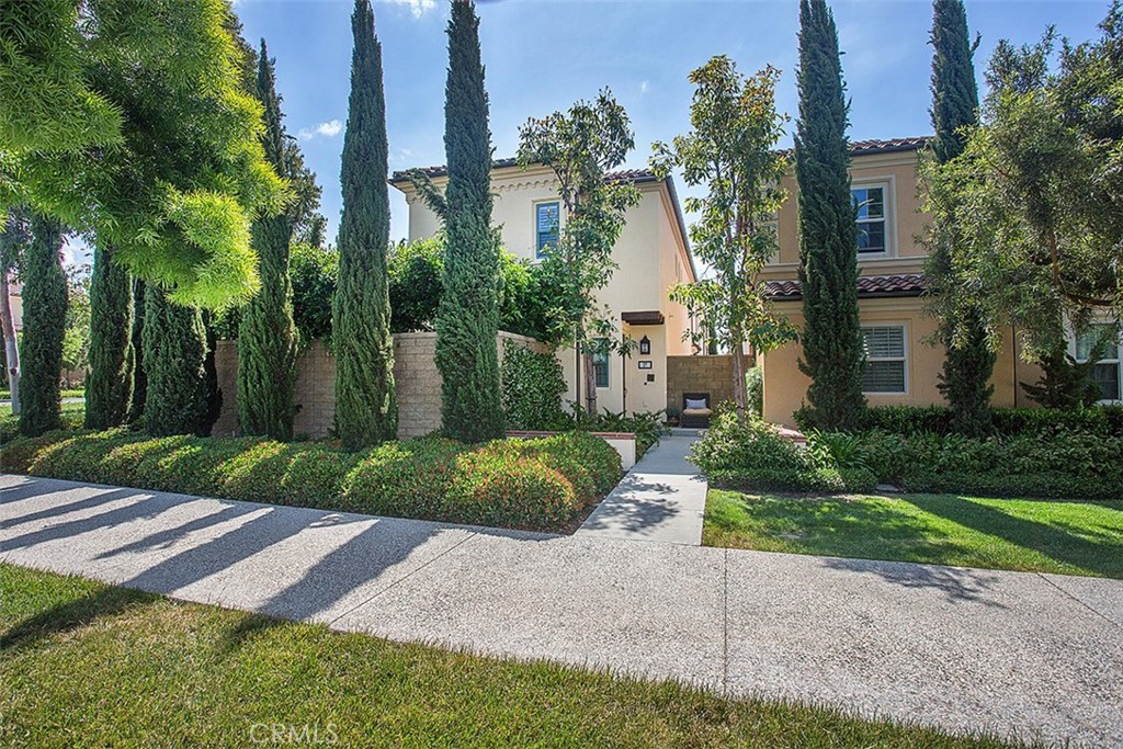 Exquisitely upgraded, beautiful 3 bedrooms PLUS LOFT home with DRIVEWAY with SUPERIOR LOCATION; street facing, end of cul-de-sac and ON GREEN BELT. ATTACHED ONLY AT GARAGE. This amazing home offers the LARGEST LOT IN THE TRACT boasting above ground Jacuzzi and ABUNDANCE OF LIGHTS and WINDOWS. Located steps from Cypress Village Elementary School and beautiful park. As you enter, you are greeted with a breathtaking, bright great room, boasting beautifully upgraded wood floors. Gourmet kitchen equipped with extensive granite counter space, grand center island with breakfast bar, and stainless steel appliances. From the kitchen and dining room enter the beautiful WRAP-AROUND yard with pavers. There are extensive upgrades throughout; including designer selected wood floors throughout downstairs, LED recessed lightings, plantation shutter window covering, 2 Ecobee smart thermostat, Ring, custom paint, and convenient upstairs laundry room. Grand master and 2nd bedroom offer large walk-in closets. Enjoy the oversized 2-car garage with tank less water heater and custom installed overhead storage.
Be entertained by resort-style amenities, including pool, spa, sport courts, tot lots, BBQ grills, picnic tables, playgrounds, and parks. Shopping and dining are conveniently located at nearby Cypress Village Shopping Center, Irvine Spectrum, and Tustin Marketplace.