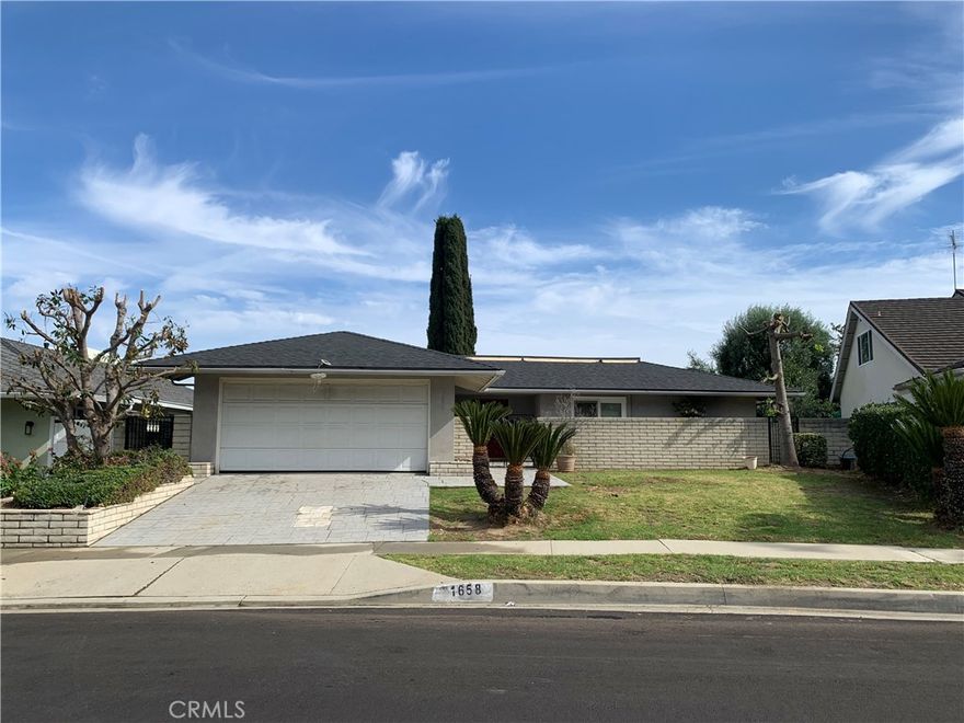 Location, location, location!! This charming ranch home is located on a quiet and serene street with excellent schools. recently total renovation and absolutely ready to move-in condition. 4 bedroom and 2 bathroom, A wonderful entry opens to a huge living room with a beautiful brick fireplace and sliding glass doors opens to amazing views and a large patio!! Master bedroom has a master bathroom, walk in closet and sliding glass doors that lead to the patio. Large windows and doors that welcome bright natural sunlight and views from many of the rooms. Separate laundry room off of the kitchen with lots of storage cabinets. Convenient location close to shopping malls, schools, restaurants, supermarkets and freeways.