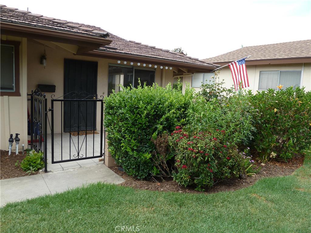 Coco Palms is approved for FHA loans!! 3.5% down gets you into your own home! Association clubhouse, laundry facilities, swimming pool and spa, bbqs, and a grassy area for residents and their guests. And the low $270/month HOA dues includes water, trash, sewer, and exterior maintenance which includes landscaping. This lovingly renovated 2 bedroom, 2 bath end unit condo is bright and cheerful. That's right, just one common wall. Single story buildings - no one above and no one below! New wood laminate flooring, newer kitchen cabinets and granite counters, newer appliances, designer colors, recently remodeled hall bath, scraped ceilings, and re-surfaced walls throughout. And central A/C! Coco Palms is known for it's lush landscaping, and you can enjoy it all on a stroll through the complex, or just sitting on your private gated patio.