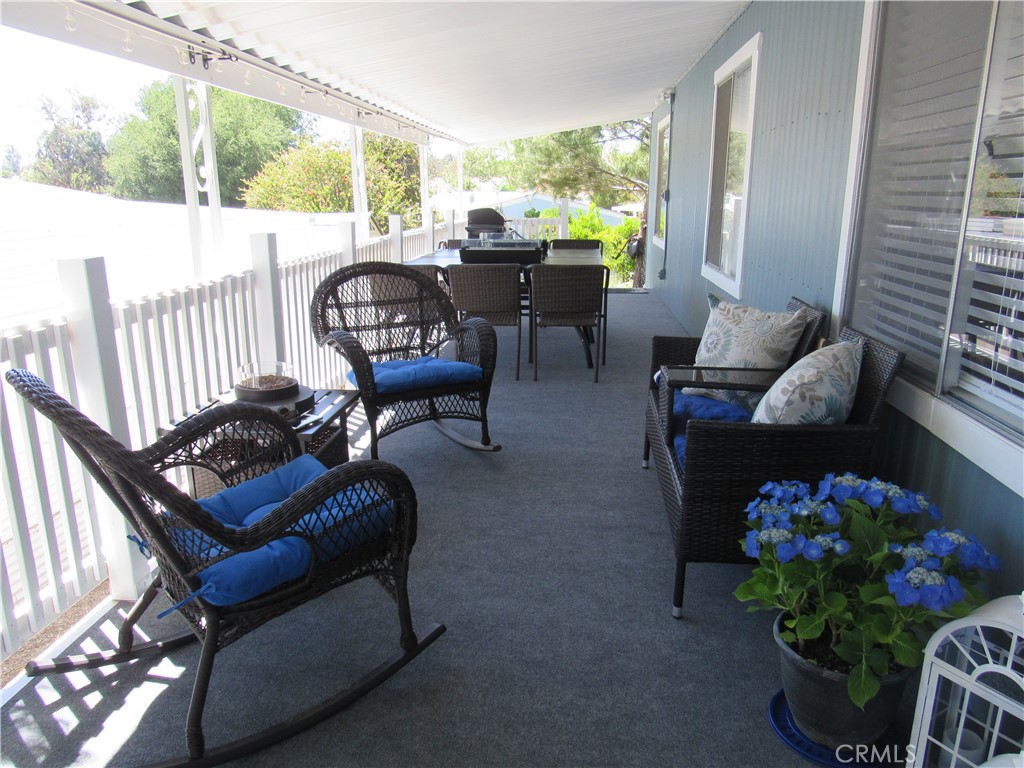 Gorgeous upgraded mobile home shows like a model home in desirable Heritage Park for ages 55 and better. Wow this is by far one of the nicest homes you will find!!! Brand new AC, furnace, upgraded kitchen, both bathrooms redone, new flooring, and paint, etc. Water heater only 3 yrs new. Roof repaired and coated by professional roofing company. Everyone wants an open floor plan this home has it. Also has a pantry. Huge deck with a nice mountain view to enjoy your morning cup of coffee and a glass or two glasses of wine in the late afternoon/evenings with great breezes that Temecula has to offer. Perfect location in Temecula. Clubhouse is very nice too with a gym, kitchen, BBQ area by the heated pool and spa. Close to lots of amenities including shopping, post office, great Restaurants, Pechanga casino and wineries are minutes away just right down the street.. Very quiet park. space rent approx. 850 a month plus about another 50 month for water, trash and sewer. Need park approval. call for details. Thank you!!