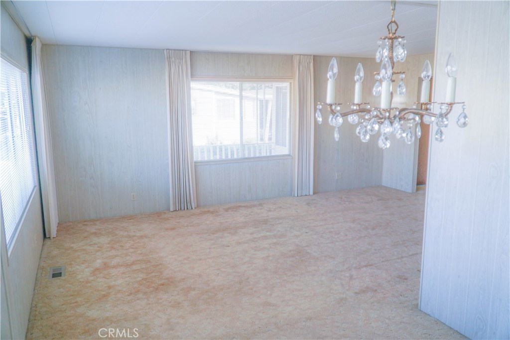 Located in Laguna Lake Mobile Estates, this well maintained 1381 square foot, 2 bedroom/2 bathroom home features an open floor plan with a large living room opening into the dining area. The kitchen has ample storage space and bright cabinets, a pantry, and vinyl tile floors. Both bedrooms have oversized closets and the master bedroom has two closets and the master bathroom has a large dressing area and shower. This home includes an enclosed patio with easy access to the backyard. Laguna Lake Mobile Estates is an affordable San Luis Obispo community with outstanding amenities such as a large community swimming pool with a whirlpool-spa-hot tub, well maintained shuffle board courts, and RV storage to make your life easier. Located adjacent to Laguna Lake Golf Course and minutes away from local shopping and dining, this pet-friendly neighborhood also features a great playground for the grandkids, an amply stocked library for your reading enjoyment, and both a horseshoe pit and a fitness center to help maintain an active lifestyle. The spacious clubhouse includes a billiard room and stocked game room, and there are a variety of community organized activities to help keep you entertained and involved with your neighbors. Call today to view this property and become a part of a thriving San Luis Obispo area community! This property will not last long with LOW space rent of only 627.81 which includes water, sewer and trash!!!