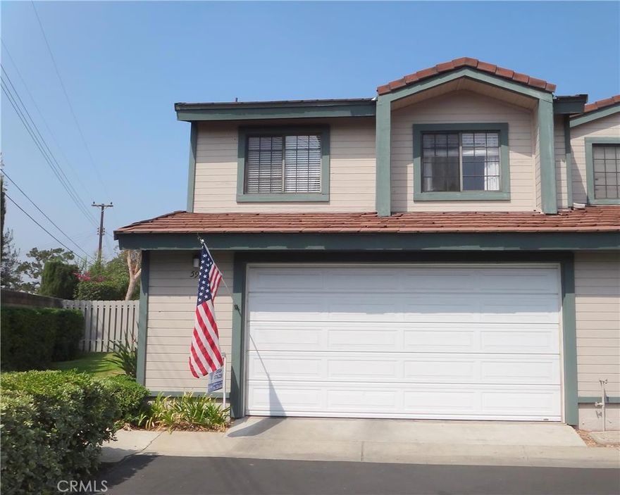 BACK ON MARKET! Buyers didn't perform. End unit with HUGE (7000 sqft) back yard plus large front yard! (Yard is 2 to 3 times larger than recent sales in this complex). Very quiet, private location in the back of the development - best location and one of the largest lots in the community! (Does not always map correctly. Last unit on very Southwest corner of complex at end of Muirwood) Only one neighbor!  Lives like a single family home!  Great natural light, cathedral ceilings, spacious open floor plan!  Home boasts wood laminate floors in living areas and tile in the kitchen.  Balcony off master overlooks back yard.  Dual sinks in master bath.  Built in hutch and bookcases in kitchen.  Attached direct entry 2 car garage.  Large yard with hardscape makes entertaining for a crowd a breeze!  Brea Schools!  Close to Brea Mall, Craig Park, shopping, schools and freeways.  This community is undergoing a makeover so pardon the dust but it will soon look great with a fresh coat of paint!  Take advantage of low interest rates and make this lovely home your own!