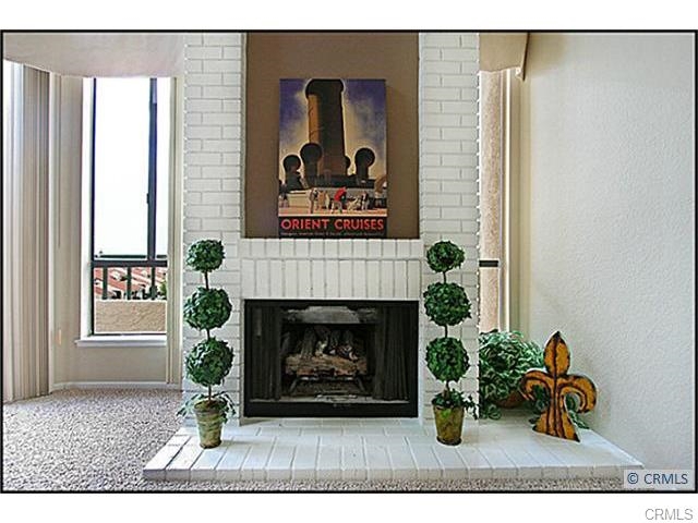 HIGHLY UPGRADED & MODEL PERFECT 2 BEDROOM + LOFT, GATED COMMUNITY! Spacious floor plan, large step-down living room, soaring cathedral ceilings, huge windows, floor-to-ceiling brick fireplace, sliding glass door access to private patio deck. Dining room opens up kitchen, new gas range & dishwasher, new ceramic tile floors, designer faucet, tile countertops & full backsplash, pantry & large breakfast nook. Upgrades include new granite vanities in both bathrooms, new lights, fixtures. Large deck and views Neighborhoods: Mission Viejo Equipment: Dryer,Garage Door Opener, Range/Oven, Washer Other Fees: 19 Other Fees Type: , Sewer: Sewer Connected Topography: GSL
