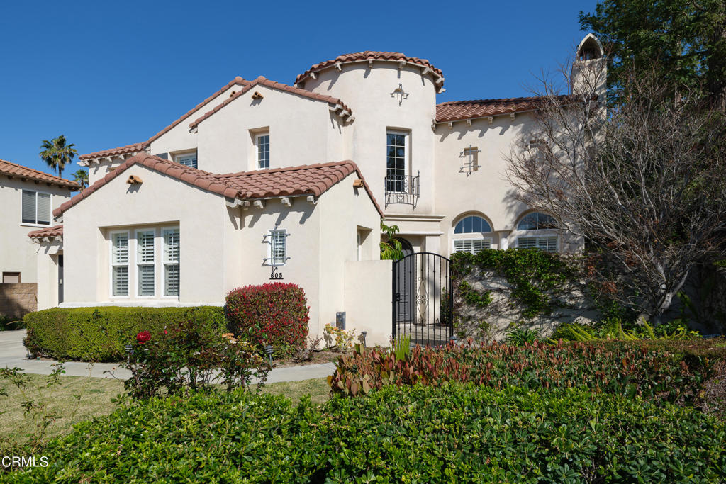 Welcome home to this Estate located within the gated community of La Vina. Whether you enjoy the quietude of getting away from it all, or close access to the Rose Bowl, Old Pasadena, major freeways, and DTLA, you'll find it all here in this elegant home. A breathtaking vaulted circular foyer and spacious hallways open up to a modern living room with grandiose two-story ceilings that feature a fireplace and picturesque windows that look out to the front courtyard. A formal dining room with beautiful natural light provides additional space for entertaining. The private downstairs en-suite bedroom with a full bathroom is perfect for guests.The large open kitchen featuring a substantial center island and a walk-in pantry opens up to a sunny dining alcove that shares a two-sided fireplace with a spacious family room. A functional laundry room is nestled between the kitchen and 2-car garage for easy access. A second large downstairs room has a walk-in closet and windows overlooking the front courtyard and is perfect for a game room, library, office, or an additional bedroom.Venture upstairs to an oversized loft connecting two bedrooms with separate vanities flanking the full bathroom. The spacious primary suite bathroom features double vanities, a walk-in shower, and an oversized soaking tub. The grand walk-in closet has been completed with beautiful built-ins.The backyard rounds out this gorgeous property with an enchanting patio! The La Vina community features a community playground, pool, walking paths through meditative Oak tree groves, guard, and access to an extensive network of hiking trails in the Angeles National Forest. Minutes to Old Pasadena and 15 miles to downtown Los Angeles.