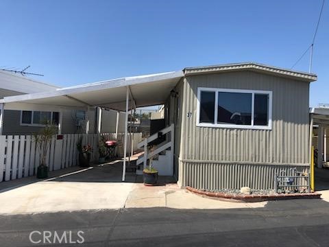 Hurry this is a great opportunity to buy this very affordable home in the Sunny South Bay area. This manufactured home is located in an all age family park that is Rent Controlled space rent of $935. through LA County! Yes Rent Controlled* This home features one bedroom one bath comfortable living room and open kitchen combo, laundry hook ups inside. Two car parking one with covered patio and the other assigned parking space. Storage shed and a very nice patio area for those great summer gatherings and BBQ's. Its location in very close to shopping and entertainment. a is reasonably priced for a quick cash sale. Take a drive and call so I can show you this affordable home.