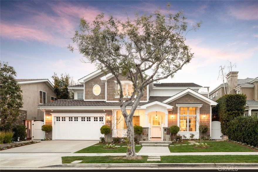 Built in 2017, this spectacular Cape Cod inspired home is one of the finest to become available in the coveted Port Streets community. Situated on an oversized lot of 8,190 square feet, this property is a true rarity as it is also located just steps to the greenbelt in the desirable “inner loop” location. Curated with meticulous attention to detail and stylish finishes throughout, the residence encompasses 6 bedrooms, 6.5 baths, and an impressive gym, which could also be used as a home office. A charming front porch welcomes all that visit with a swinging loveseat, providing a leisurely spot to enjoy Newport's famed climate. Through the Dutch door entry, an open floor plan presents multiple entertaining spaces, which include a living and dining room, an exquisite gourmet kitchen and elegant family room looking onto the serene rear yard, creating a seamless flow for entertaining. Large glass pocket doors open to the expansive patio, complete with private pool, spa, built-in bbq, and outdoor living room and large play area. A conveniently located downstairs bedroom and gym complete the main level of this lovely home. Upstairs, the four additional spacious en-suite bedrooms join the luxurious master suite, boasting a vaulted ceiling, fireplace, large walk-in closet, and soaking tub. Ideally located near award-winning Andersen Elementary, the resort-style pool & clubhouse, and greenbelts, enjoy all this spectacular home and the coveted Port Streets have to offer.