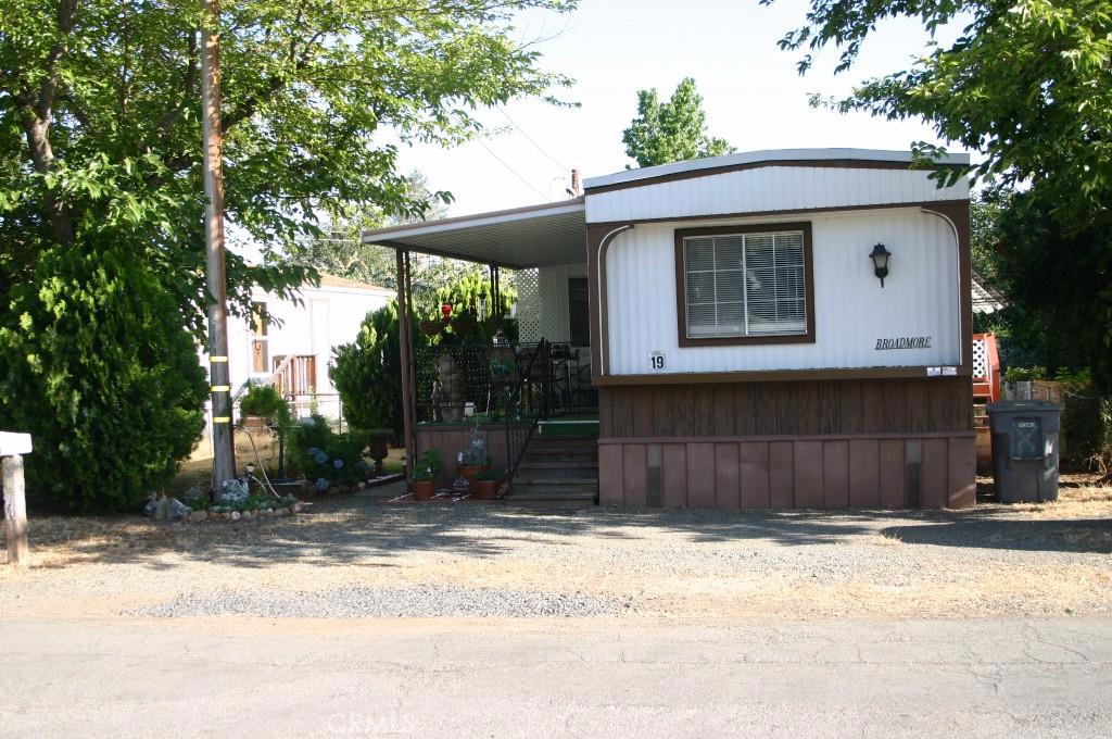 Very well cared for single wide with a slide out in park. It looks younger than it's age. The location is ideal, just outside of city limits and a short drive to downtown. It is near the area of Palermo with quick and easy access to Hwy. 70. The spacious floor plan has a master bedroom and bathroom at the front and rear! The living room area is double that of a single wide with the bonus slide out adding to the actual space. The kitchen is set up very conveniently adjacent to the dining area. The indoor laundry room is tucked just out of site near the kitchen and back door. There is no lack of storage indoors with plenty of built ins and two storage sheds for outdoors as well. The front deck at the entrance is very inviting and perfectly sized for outdoor dining. The "curb appeal", clean street view and the landscaping/gardening areas are sure to please your buyers.