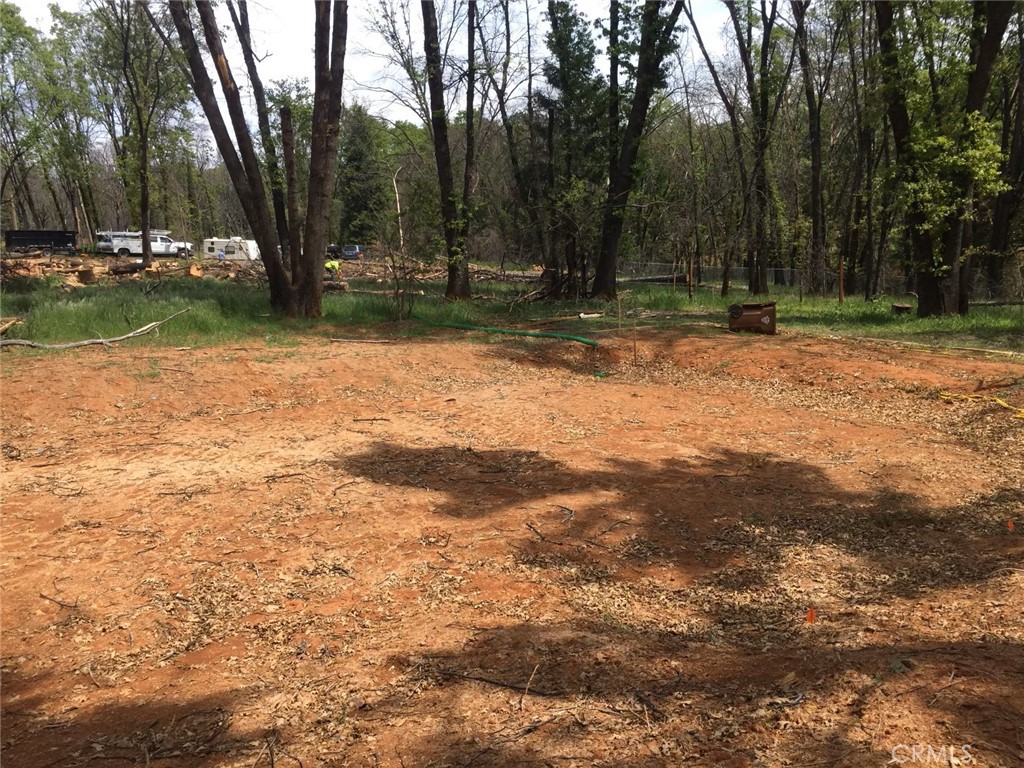 This is an opportunity to own a beautiful lot in Magalia and build the home of your dreams. A wonderful bonus is it is on property is on a quiet, picturesque cul-de-sac. Water and power at property. The property has been beautifully groomed and cleaned! It is ready for a new build!