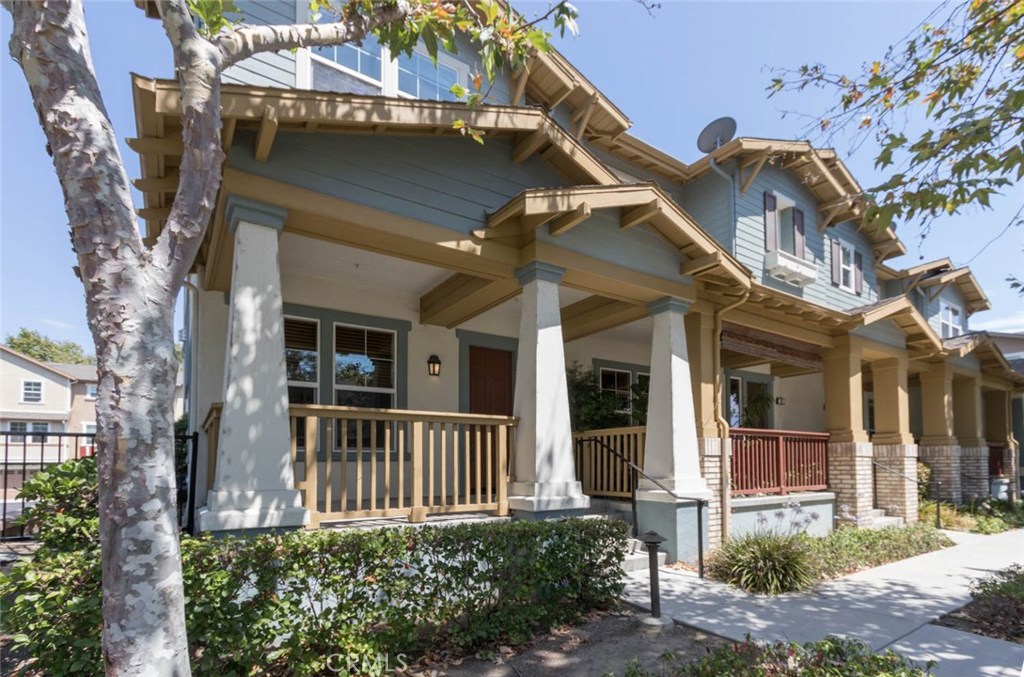 View, View,View. No cars parked in front of your home, rarely does anyone walk by....very relaxing. Welcome to popular Briar Rose neighborhood in Terramor Village. Large covered private front porch with plenty of room to entertain family and friends while watching folks walk the nearby nature path.This spacious and updated Townhome features easy care and stylish slate flooring in main living areas and plush carpet on stairs and bedrooms. The open floor plan is fabulous. You enter the living room area then easily transition up a few stairs to the dining room, family and huge open kitchen. Kitchen features crisp white cabinets with contrasting beautiful dark granite counters. The many windows fill the space with tons of light. Upstairs are the master suite and two secondary bedrooms with share a full bath. Laundry room is conveniently located on this level too. Two car direct access with unbelievable amount of storage. Enjoy the many parks, pools, walking paths and activities Ladera Ranch has to offer.