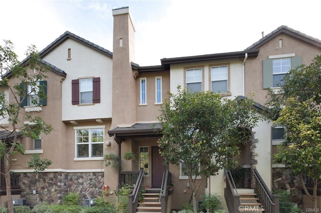 Beautiful highly desirable Camden Park Townhome for lease. The home has a very light and bright floor plan with lots of natural lighting. Home features two bedrooms and two bathrooms and a private work station upstairs. Downstairs you will find a spacious living room with a beautiful tiled fireplace and new tiled floors throughout. Attached you will find a MASSIVE kitchen with ample storage and sliding glass door that leads to the private balcony, perfect for enjoying the coastal breeze and summer nights. 2 Car Garage has additional storage area. Home is zoned to some of the Highest Rated Schools in South Orange County. Aliso Woods Canyon trails are walking distance to the home or a 2 minute drive! Some of the best hiking in the County! Must see to appreciate.